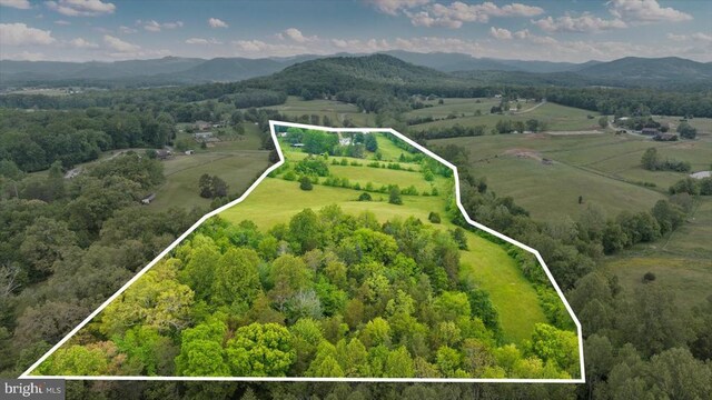 2188 Seville Rd, Madison, VA 22727 - aerial view of sparsely populated area with property parcel outlined and a mountainous background