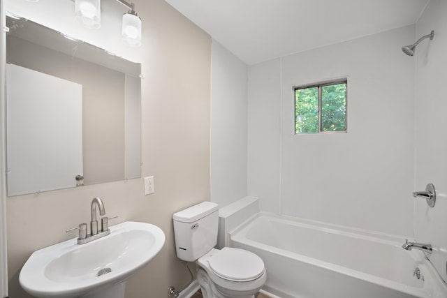 full bathroom featuring sink, shower / tub combination, and toilet