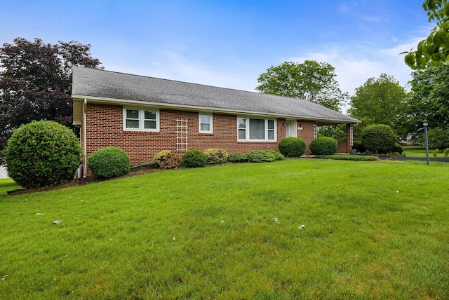 3226 Old Thirty Three Rd, Rockingham, VA 22801 - view of front facade with brick siding, a front lawn, and roof with shingles