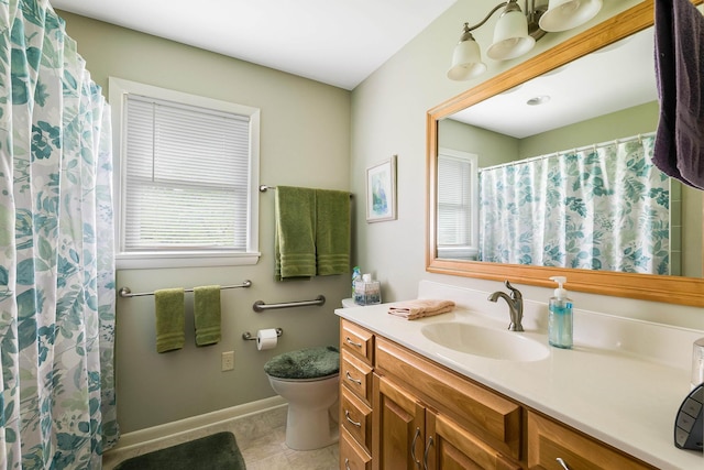 3226 Old Thirty Three Rd, Rockingham, VA 22801 - full bathroom with vanity, toilet, healthy amount of natural light, and baseboards