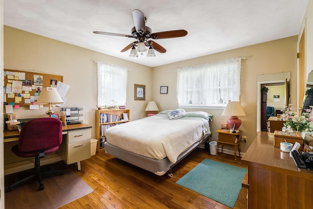 3226 Old Thirty Three Rd, Rockingham, VA 22801 - bedroom featuring an office area, wood finished floors, and a ceiling fan