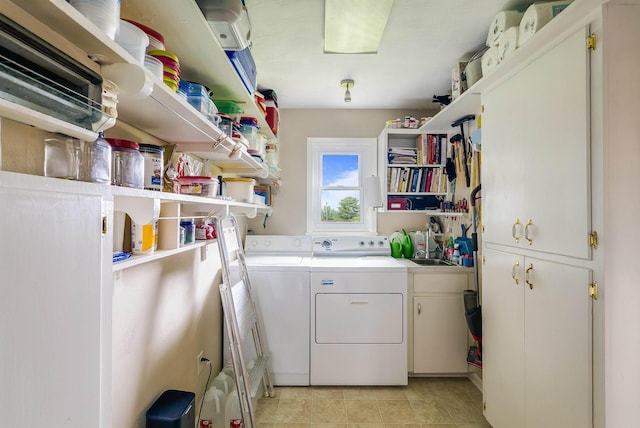 3226 Old Thirty Three Rd, Rockingham, VA 22801 - laundry area with cabinet space, washer and dryer, and light tile patterned floors