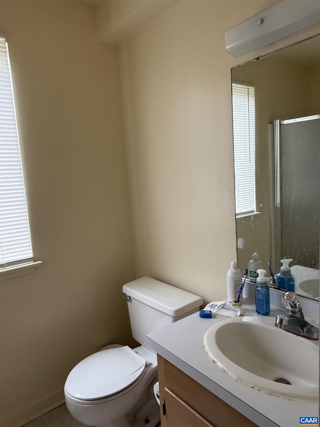 2108 Jefferson Park Ave, Charlottesville, VA 22903 - bathroom featuring vanity, toilet, and an enclosed shower