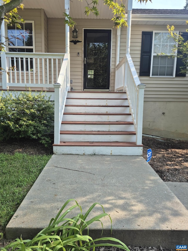 1060 E River Rd, Palmyra, VA 23055 - view of exterior entry featuring a porch