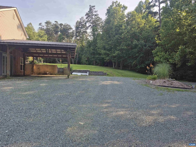 1060 E River Rd, Palmyra, VA 23055 - view of green lawn with a carport