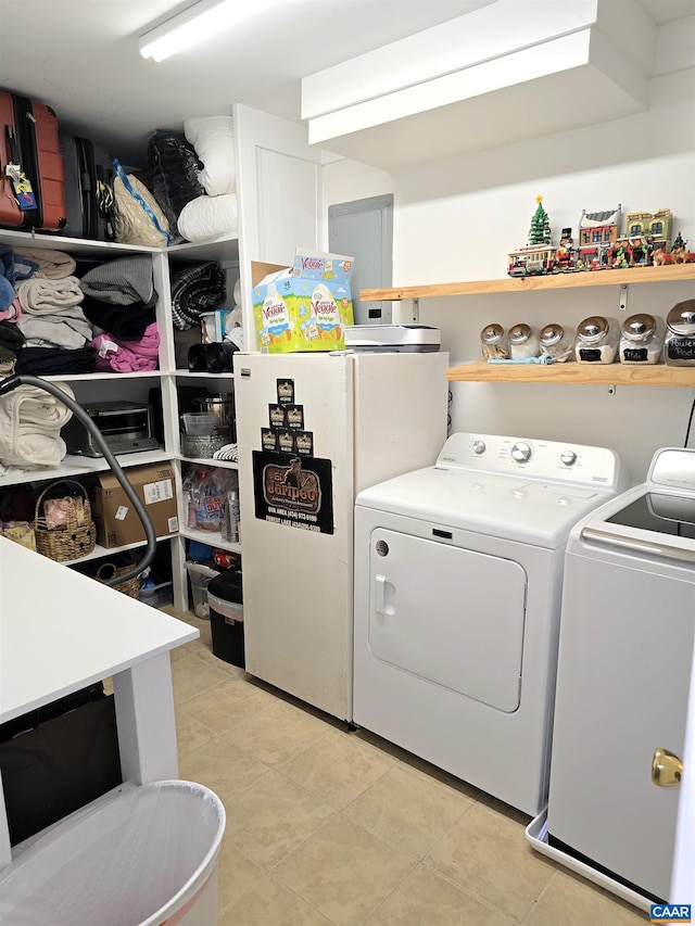 1060 E River Rd, Palmyra, VA 23055 - washroom with independent washer and dryer and light tile patterned flooring