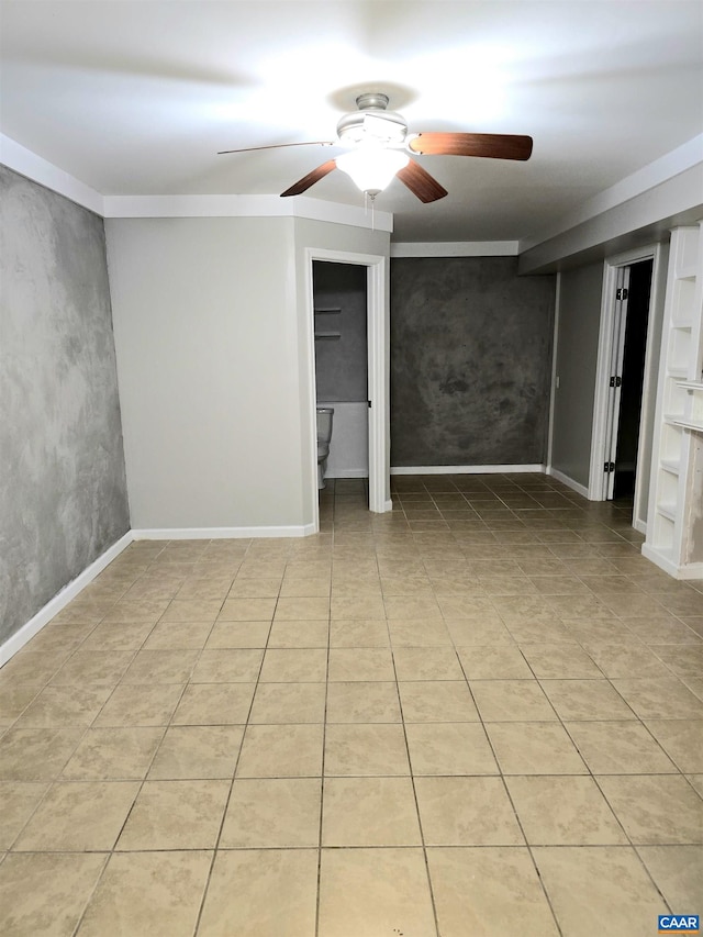 1060 E River Rd, Palmyra, VA 23055 - empty room with ceiling fan and light tile patterned floors
