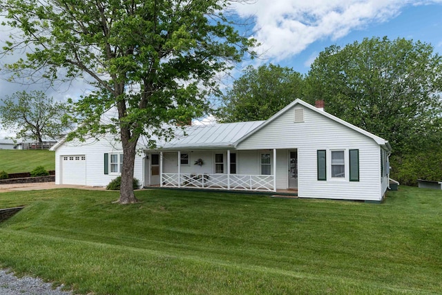 ranch-style home with a porch, a front lawn, a garage, and a chimney