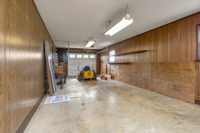garage with wood walls
