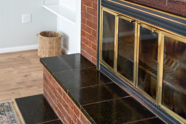 detailed view of wood finished floors and baseboards