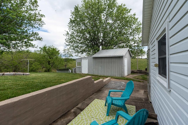 view of patio featuring an outbuilding and a storage shed