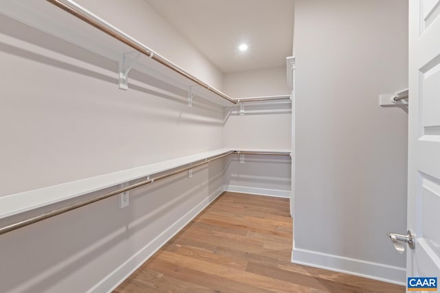 walk in closet featuring light wood-type flooring