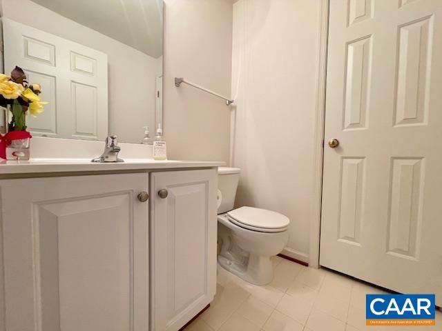 151 Deer Run Dr, Zion Crossroads, VA 22942 - bathroom featuring toilet, vanity, and tile patterned floors