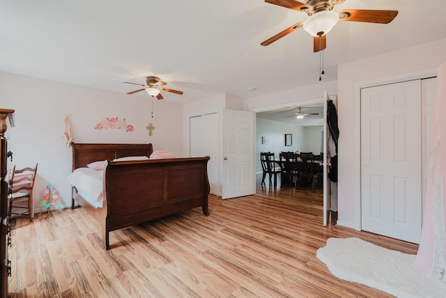 bedroom featuring light wood-type flooring and a ceiling fan