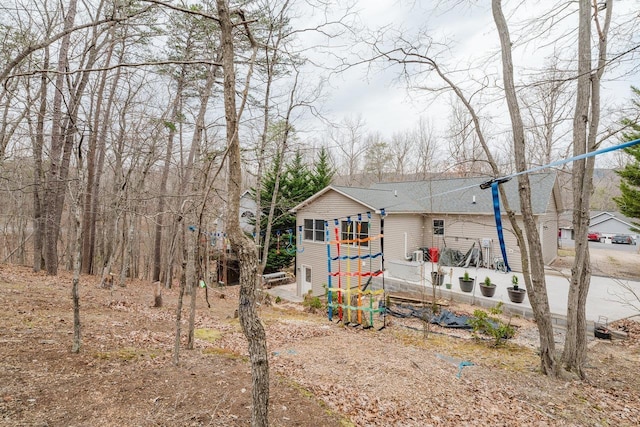 view of front of house with roof with shingles