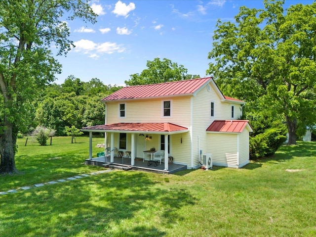 6772 S E Side Hwy, Elkton, VA 22827 - back of property featuring a standing seam roof, metal roof, a yard, a cooling unit, and a patio