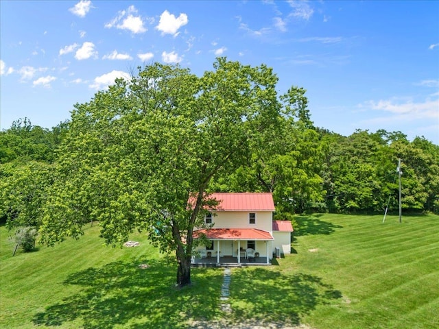 6772 S E Side Hwy, Elkton, VA 22827 - view of front of house with a front lawn, metal roof, and a view of trees