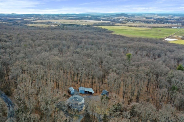 bird's eye view featuring a forest view