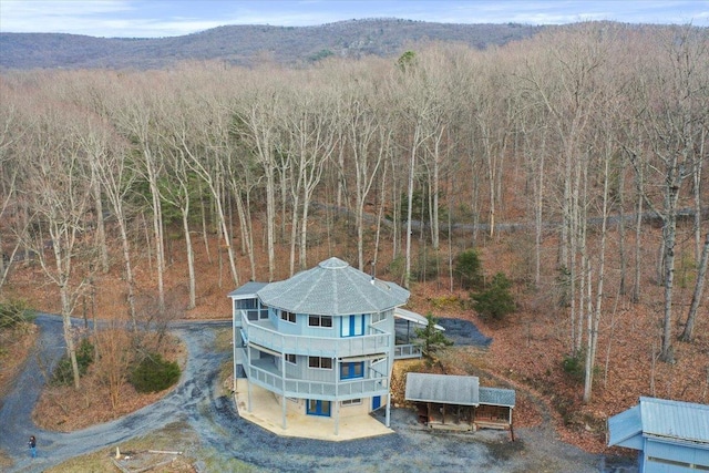 aerial view featuring a forest view