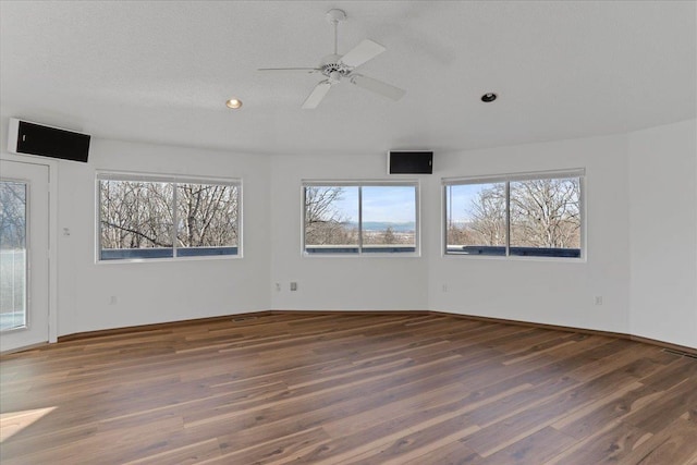 unfurnished room featuring ceiling fan, recessed lighting, visible vents, and wood finished floors