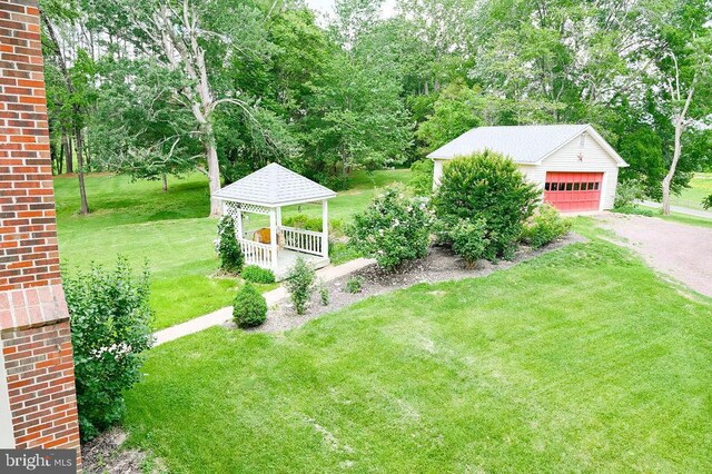 13498 Chesterfield Ln, Culpeper, VA 22701 - view of green lawn featuring a gazebo, an outbuilding, a detached garage, and view of scattered trees
