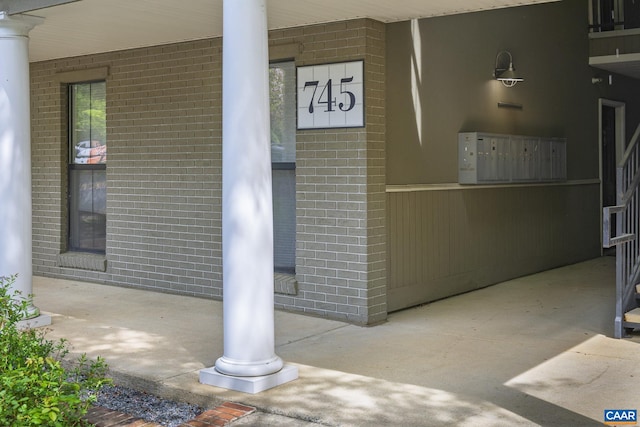 entrance to property with brick siding