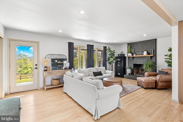 1001 Woodward Rd, Sperryville, VA 22740 - living area featuring light wood-type flooring, a fireplace, and recessed lighting