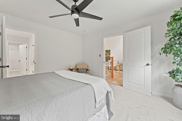 228 Poplar Dr, Louisa, VA 23093 - bedroom with light carpet, baseboards, and a ceiling fan
