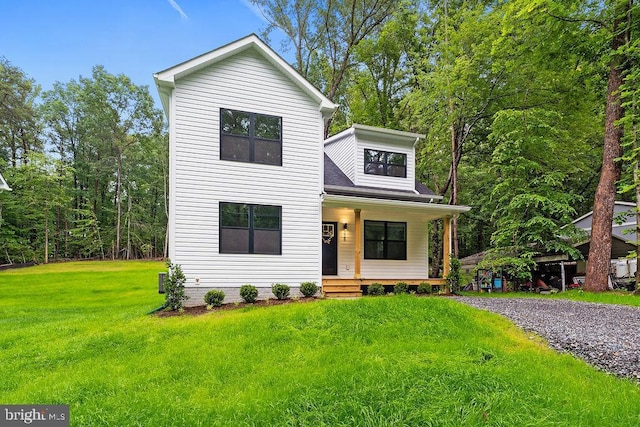 228 Poplar Dr, Louisa, VA 23093 - view of front facade with covered porch and a front yard
