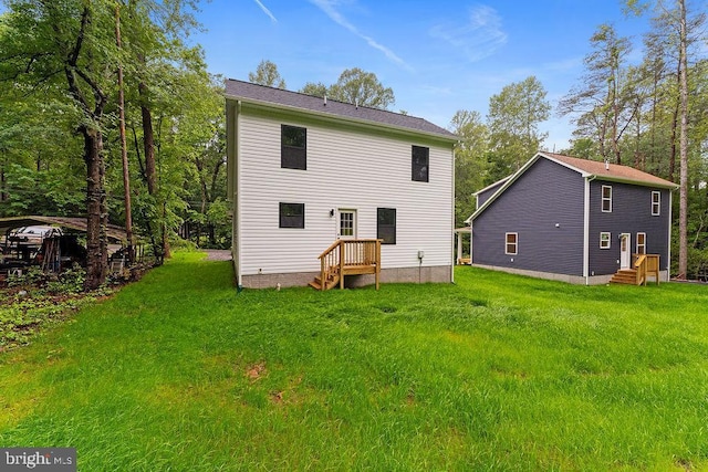 228 Poplar Dr, Louisa, VA 23093 - back of property with a lawn