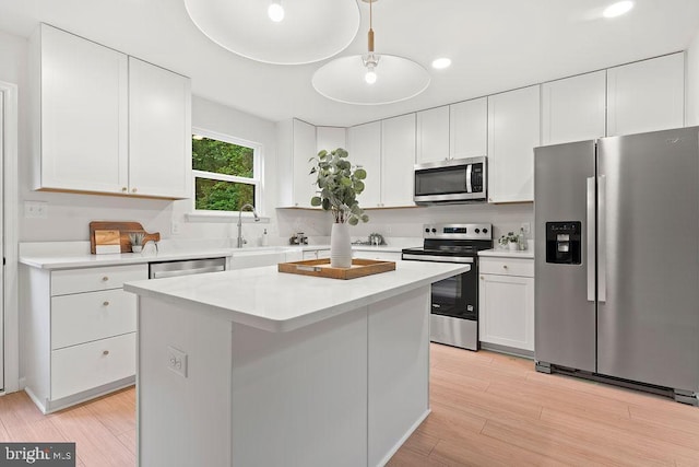 228 Poplar Dr, Louisa, VA 23093 - kitchen featuring appliances with stainless steel finishes, white cabinetry, and recessed lighting