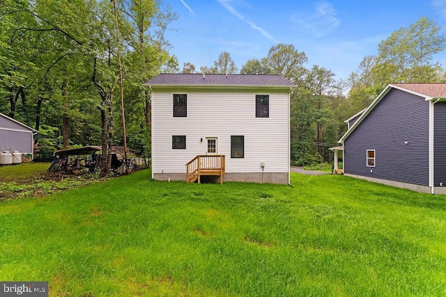 228 Poplar Dr, Louisa, VA 23093 - back of property featuring a lawn