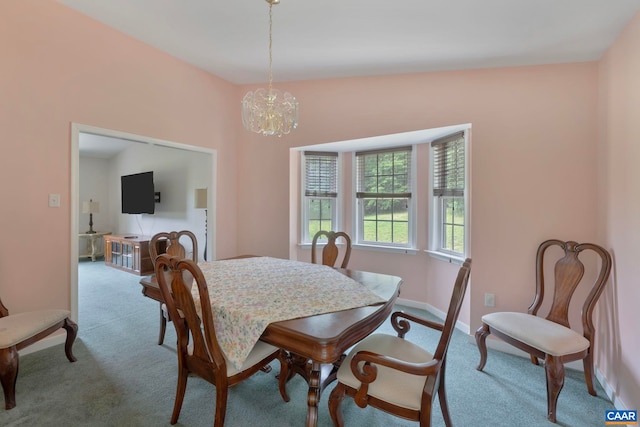 3590 Mountain Hill Rd, Palmyra, VA 22963 - carpeted dining room featuring a chandelier and baseboards