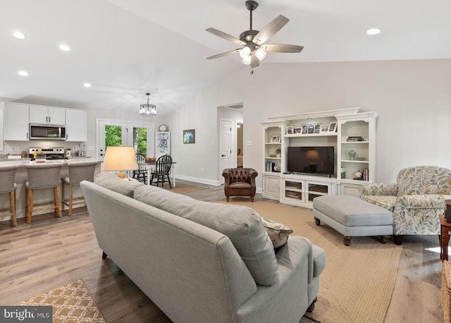 1875 Oneals Rd, Madison, VA 22727 - living area with recessed lighting, light wood-style floors, lofted ceiling, a chandelier, and a ceiling fan