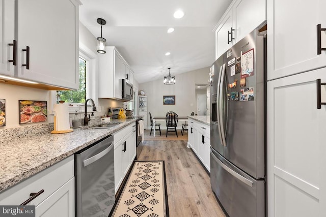 1875 Oneals Rd, Madison, VA 22727 - kitchen with stainless steel appliances, recessed lighting, a sink, light wood-type flooring, and white cabinetry