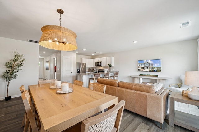 228 Camden Dr, Waynesboro, VA 22980 - dining space with wood finished floors and recessed lighting