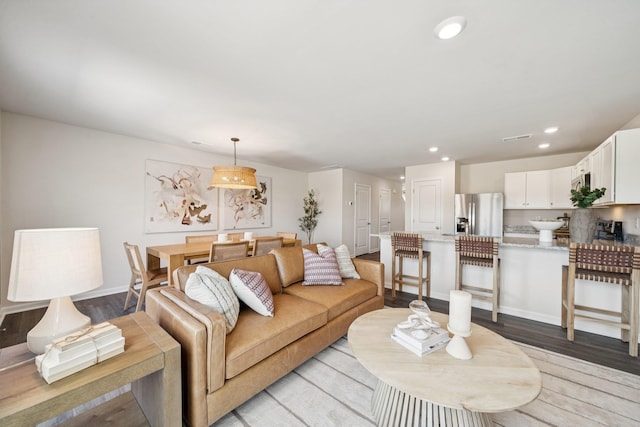 228 Camden Dr, Waynesboro, VA 22980 - living room featuring light wood finished floors and recessed lighting