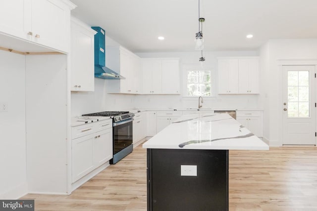 29 Dove Ct, Bumpass, VA 23024 - kitchen featuring stainless steel appliances, wall chimney range hood, plenty of natural light, light countertops, and recessed lighting