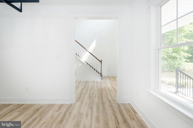 29 Dove Ct, Bumpass, VA 23024 - unfurnished room with wood finished floors and stairway