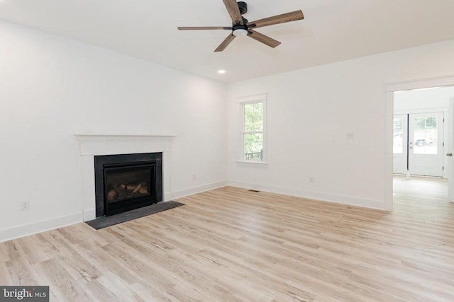 29 Dove Ct, Bumpass, VA 23024 - unfurnished living room with light wood-style floors, a ceiling fan, a fireplace with flush hearth, and recessed lighting