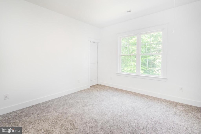 29 Dove Ct, Bumpass, VA 23024 - carpeted spare room with baseboards