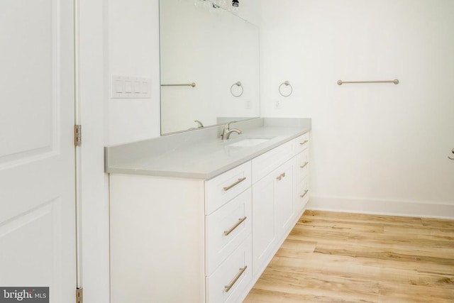 29 Dove Ct, Bumpass, VA 23024 - bathroom with vanity and wood finished floors