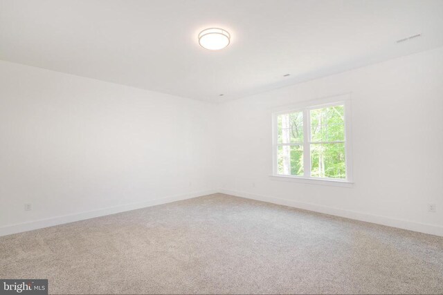 29 Dove Ct, Bumpass, VA 23024 - unfurnished room featuring baseboards and light carpet