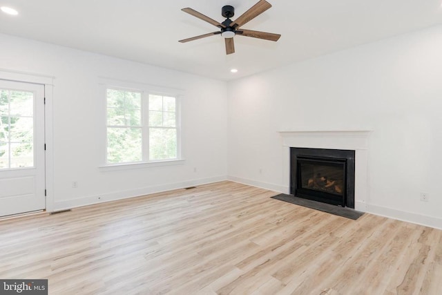 29 Dove Ct, Bumpass, VA 23024 - unfurnished living room with recessed lighting, healthy amount of natural light, wood finished floors, a ceiling fan, and a fireplace with flush hearth