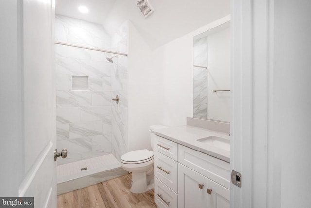 29 Dove Ct, Bumpass, VA 23024 - full bathroom featuring vanity, a shower stall, and wood finished floors