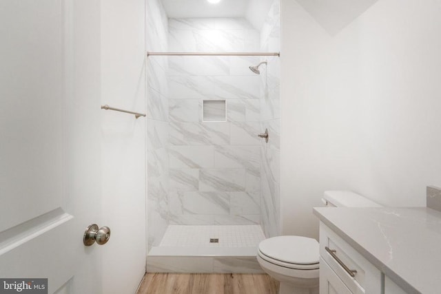 29 Dove Ct, Bumpass, VA 23024 - bathroom featuring a shower stall, vanity, and wood finished floors
