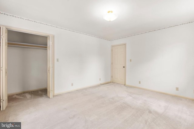 411 Laurel Ave, Fredericksburg, VA 22408 - unfurnished bedroom featuring light carpet and baseboards