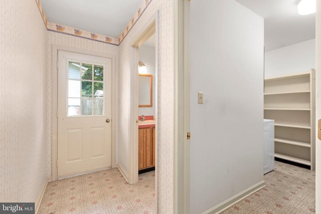 411 Laurel Ave, Fredericksburg, VA 22408 - hall with tile patterned floors and wallpapered walls