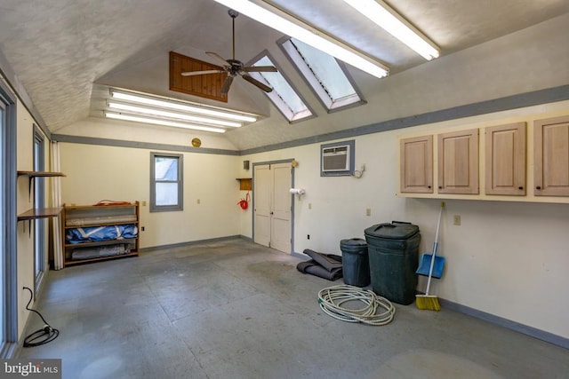 411 Laurel Ave, Fredericksburg, VA 22408 - garage with ceiling fan and an AC wall unit