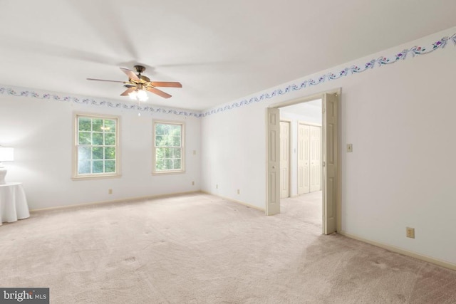 411 Laurel Ave, Fredericksburg, VA 22408 - spare room featuring ceiling fan and light colored carpet
